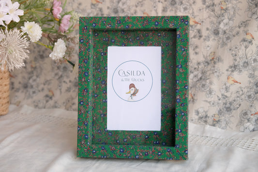 Marco de fotos entelado verde de flores